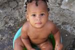 A Dominican child’s exposure to “bush medicine” begins within her first months of life