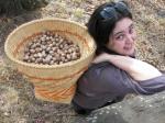 Shawna Cain carries hickory nuts