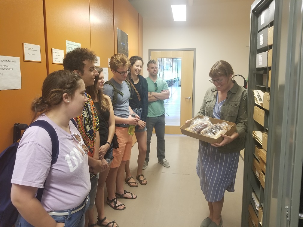 Students examine reference collection 